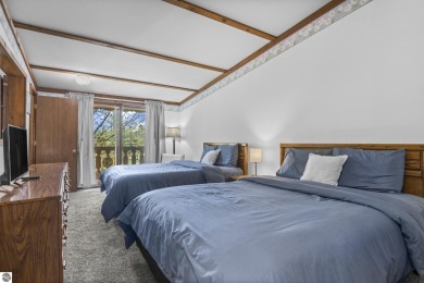 This is a sharp two-bedroom condominium located within 500 feet on Schuss Mountain Golf Club in Michigan - for sale on GolfHomes.com, golf home, golf lot