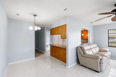 UPGRADED HOME for a GREAT PRICE on a CORNER LOT in a GOLF-CART on Falcon Watch Golf Club in Florida - for sale on GolfHomes.com, golf home, golf lot