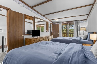 This is a sharp two-bedroom condominium located within 500 feet on Schuss Mountain Golf Club in Michigan - for sale on GolfHomes.com, golf home, golf lot