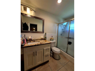 THIS HOME IS THE LARGEST MODEL BUILT IN THE COMMUNITY. IT CAN BE on Oriole Golf and Tennis Club in Florida - for sale on GolfHomes.com, golf home, golf lot