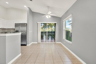 THIS GATED GOLF COMMUNITY HOME IS SITUATED ON THE 13TH HOLE OF on Plantation Palms Golf Club in Florida - for sale on GolfHomes.com, golf home, golf lot