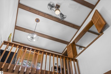 This is a sharp two-bedroom condominium located within 500 feet on Schuss Mountain Golf Club in Michigan - for sale on GolfHomes.com, golf home, golf lot