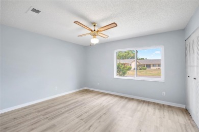 UPGRADED HOME for a GREAT PRICE on a CORNER LOT in a GOLF-CART on Falcon Watch Golf Club in Florida - for sale on GolfHomes.com, golf home, golf lot