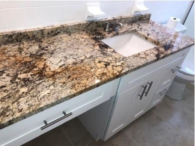 THIS HOME IS THE LARGEST MODEL BUILT IN THE COMMUNITY. IT CAN BE on Oriole Golf and Tennis Club in Florida - for sale on GolfHomes.com, golf home, golf lot