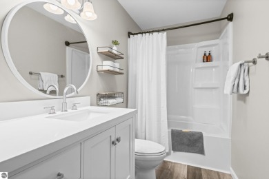 This is a sharp two-bedroom condominium located within 500 feet on Schuss Mountain Golf Club in Michigan - for sale on GolfHomes.com, golf home, golf lot