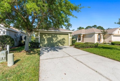 THIS GATED GOLF COMMUNITY HOME IS SITUATED ON THE 13TH HOLE OF on Plantation Palms Golf Club in Florida - for sale on GolfHomes.com, golf home, golf lot