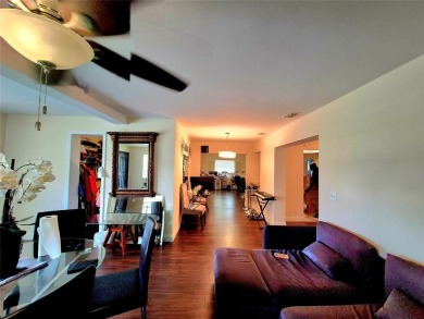 THIS HOME IS THE LARGEST MODEL BUILT IN THE COMMUNITY. IT CAN BE on Oriole Golf and Tennis Club in Florida - for sale on GolfHomes.com, golf home, golf lot