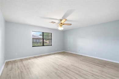 UPGRADED HOME for a GREAT PRICE on a CORNER LOT in a GOLF-CART on Falcon Watch Golf Club in Florida - for sale on GolfHomes.com, golf home, golf lot