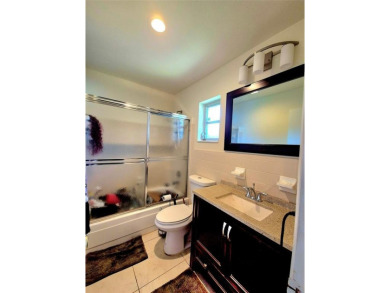THIS HOME IS THE LARGEST MODEL BUILT IN THE COMMUNITY. IT CAN BE on Oriole Golf and Tennis Club in Florida - for sale on GolfHomes.com, golf home, golf lot