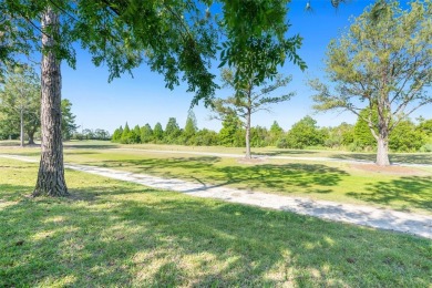 THIS GATED GOLF COMMUNITY HOME IS SITUATED ON THE 13TH HOLE OF on Plantation Palms Golf Club in Florida - for sale on GolfHomes.com, golf home, golf lot