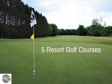 This is a sharp two-bedroom condominium located within 500 feet on Schuss Mountain Golf Club in Michigan - for sale on GolfHomes.com, golf home, golf lot