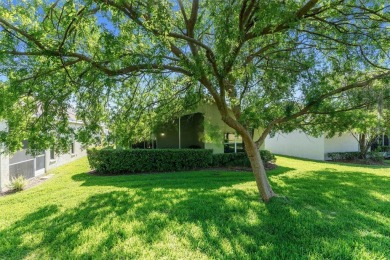 THIS GATED GOLF COMMUNITY HOME IS SITUATED ON THE 13TH HOLE OF on Plantation Palms Golf Club in Florida - for sale on GolfHomes.com, golf home, golf lot