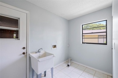 UPGRADED HOME for a GREAT PRICE on a CORNER LOT in a GOLF-CART on Falcon Watch Golf Club in Florida - for sale on GolfHomes.com, golf home, golf lot