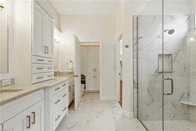 Welcome home to this lovely 3-bedroom, 3.5-bath Courtyard pool on Bonita Bay West in Florida - for sale on GolfHomes.com, golf home, golf lot