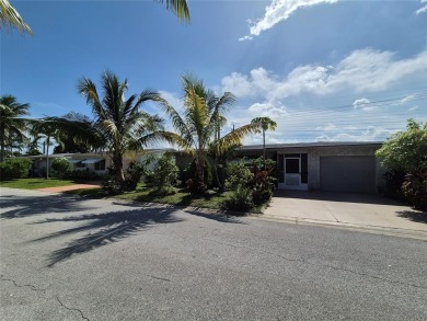 THIS HOME IS THE LARGEST MODEL BUILT IN THE COMMUNITY. IT CAN BE on Oriole Golf and Tennis Club in Florida - for sale on GolfHomes.com, golf home, golf lot