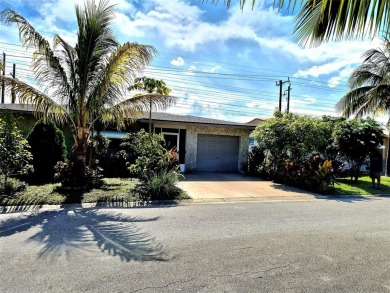 THIS HOME IS THE LARGEST MODEL BUILT IN THE COMMUNITY. IT CAN BE on Oriole Golf and Tennis Club in Florida - for sale on GolfHomes.com, golf home, golf lot