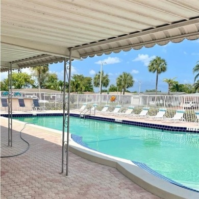 THIS HOME IS THE LARGEST MODEL BUILT IN THE COMMUNITY. IT CAN BE on Oriole Golf and Tennis Club in Florida - for sale on GolfHomes.com, golf home, golf lot