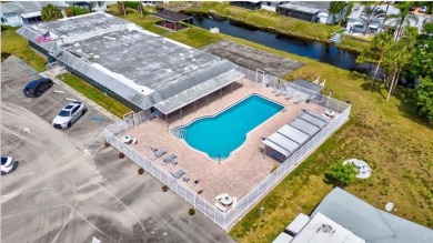 THIS HOME IS THE LARGEST MODEL BUILT IN THE COMMUNITY. IT CAN BE on Oriole Golf and Tennis Club in Florida - for sale on GolfHomes.com, golf home, golf lot