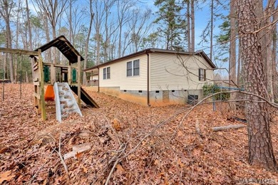 Roof replaced in 2024! This 2-bedroom + 1 Flex room home offers on Tanglewood Shores Golf Club in Virginia - for sale on GolfHomes.com, golf home, golf lot