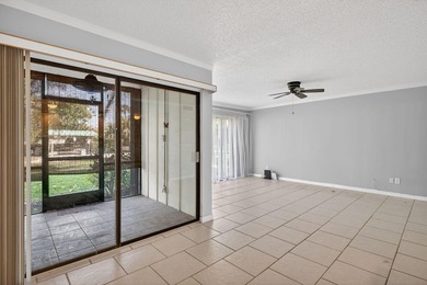Beautiful first-floor corner unit in the resort-style community on Ocean Village Golf Course in Florida - for sale on GolfHomes.com, golf home, golf lot