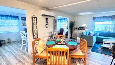 Beautiful WATERFRONT 2BR/2BA home in the desirable 55+ community on Riverbend Golf and Country Club in Florida - for sale on GolfHomes.com, golf home, golf lot