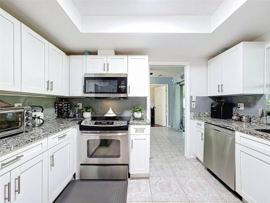 SERENITY AWAITS WITH THIS MOVE-IN READY home with private oasis on Seven Springs Golf and Country Club in Florida - for sale on GolfHomes.com, golf home, golf lot