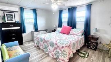 Beautiful WATERFRONT 2BR/2BA home in the desirable 55+ community on Riverbend Golf and Country Club in Florida - for sale on GolfHomes.com, golf home, golf lot