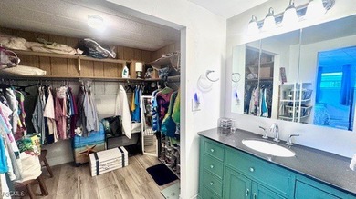 Beautiful WATERFRONT 2BR/2BA home in the desirable 55+ community on Riverbend Golf and Country Club in Florida - for sale on GolfHomes.com, golf home, golf lot