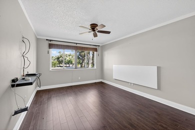 Beautiful first-floor corner unit in the resort-style community on Ocean Village Golf Course in Florida - for sale on GolfHomes.com, golf home, golf lot