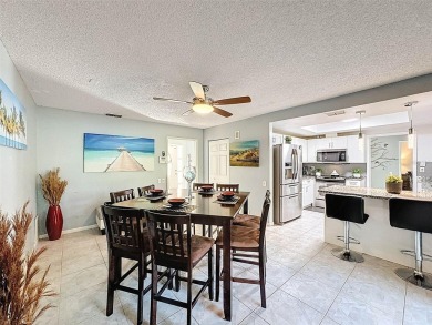 SERENITY AWAITS WITH THIS MOVE-IN READY home with private oasis on Seven Springs Golf and Country Club in Florida - for sale on GolfHomes.com, golf home, golf lot