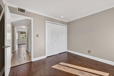 Beautiful first-floor corner unit in the resort-style community on Ocean Village Golf Course in Florida - for sale on GolfHomes.com, golf home, golf lot