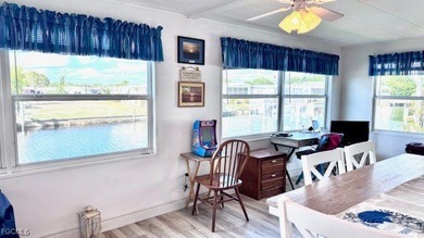 Beautiful WATERFRONT 2BR/2BA home in the desirable 55+ community on Riverbend Golf and Country Club in Florida - for sale on GolfHomes.com, golf home, golf lot