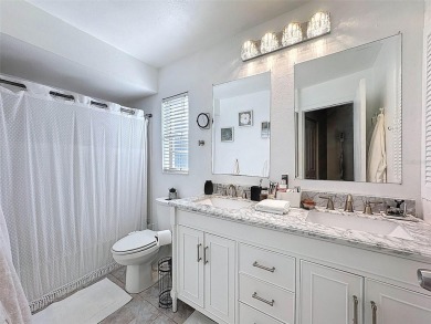 SERENITY AWAITS WITH THIS MOVE-IN READY home with private oasis on Seven Springs Golf and Country Club in Florida - for sale on GolfHomes.com, golf home, golf lot