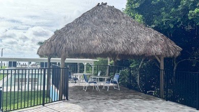 Beautiful WATERFRONT 2BR/2BA home in the desirable 55+ community on Riverbend Golf and Country Club in Florida - for sale on GolfHomes.com, golf home, golf lot