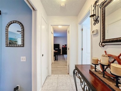 SERENITY AWAITS WITH THIS MOVE-IN READY home with private oasis on Seven Springs Golf and Country Club in Florida - for sale on GolfHomes.com, golf home, golf lot