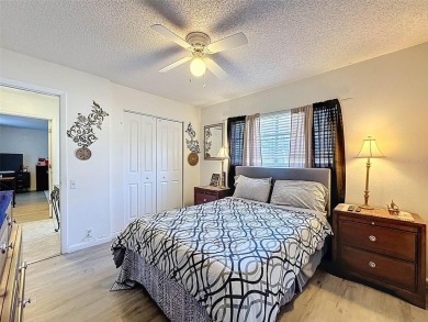 SERENITY AWAITS WITH THIS MOVE-IN READY home with private oasis on Seven Springs Golf and Country Club in Florida - for sale on GolfHomes.com, golf home, golf lot