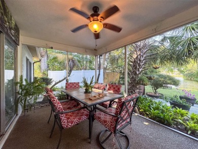 SERENITY AWAITS WITH THIS MOVE-IN READY home with private oasis on Seven Springs Golf and Country Club in Florida - for sale on GolfHomes.com, golf home, golf lot