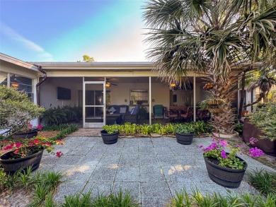 SERENITY AWAITS WITH THIS MOVE-IN READY home with private oasis on Seven Springs Golf and Country Club in Florida - for sale on GolfHomes.com, golf home, golf lot