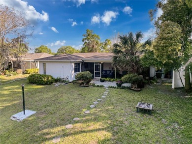 SERENITY AWAITS WITH THIS MOVE-IN READY home with private oasis on Seven Springs Golf and Country Club in Florida - for sale on GolfHomes.com, golf home, golf lot