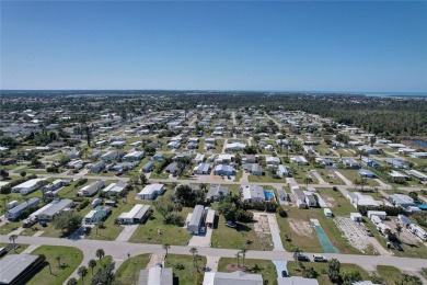 Welcome to Mobile Gardens, a peaceful and convenient community on Oyster Creek Golf Club in Florida - for sale on GolfHomes.com, golf home, golf lot