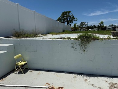 NEW PRICE on this SALTWATER CANAL-FRONT LOT with SEAWALL on Oyster Creek Golf Club in Florida - for sale on GolfHomes.com, golf home, golf lot