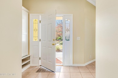 Discover relaxed coastal living in this charming 3-bedroom on Carolina National Golf Club in North Carolina - for sale on GolfHomes.com, golf home, golf lot