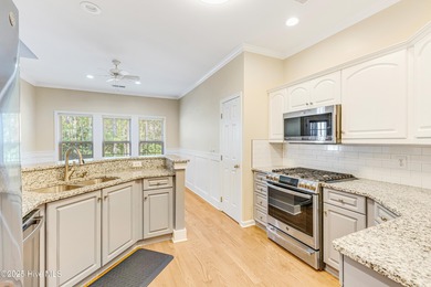 Discover relaxed coastal living in this charming 3-bedroom on Carolina National Golf Club in North Carolina - for sale on GolfHomes.com, golf home, golf lot