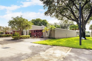 Fabulous Opportunity: charming one-story corner townhome in on Pembroke Lakes Golf Club in Florida - for sale on GolfHomes.com, golf home, golf lot