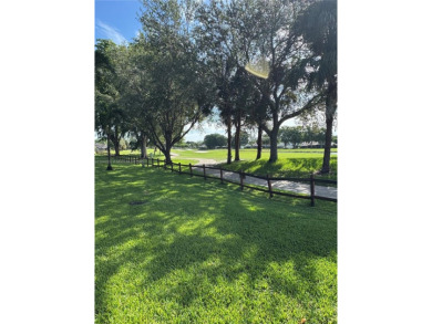 Fabulous Opportunity: charming one-story corner townhome in on Pembroke Lakes Golf Club in Florida - for sale on GolfHomes.com, golf home, golf lot