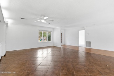 Welcome to 7922 Lanai Place, Diamondhead MS, a move-in ready on Diamondhead Country Club in Mississippi - for sale on GolfHomes.com, golf home, golf lot