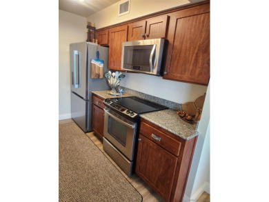 Enjoy bay and ocean views from this Tommy Bahama Beach House! on Sea and Air Golf Course in California - for sale on GolfHomes.com, golf home, golf lot