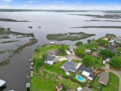 WATERFRONT HOME ON THE BACK BAY IN BILOXI! This property has on Sunkist Country Club, Inc. in Mississippi - for sale on GolfHomes.com, golf home, golf lot