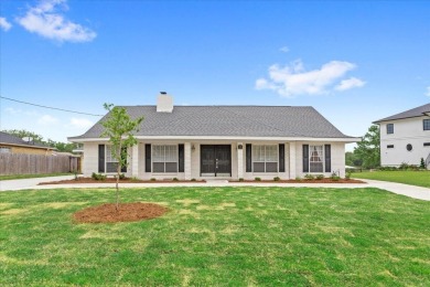 WATERFRONT HOME ON THE BACK BAY IN BILOXI! This property has on Sunkist Country Club, Inc. in Mississippi - for sale on GolfHomes.com, golf home, golf lot