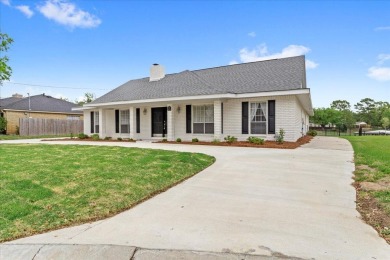 WATERFRONT HOME ON THE BACK BAY IN BILOXI! This property has on Sunkist Country Club, Inc. in Mississippi - for sale on GolfHomes.com, golf home, golf lot